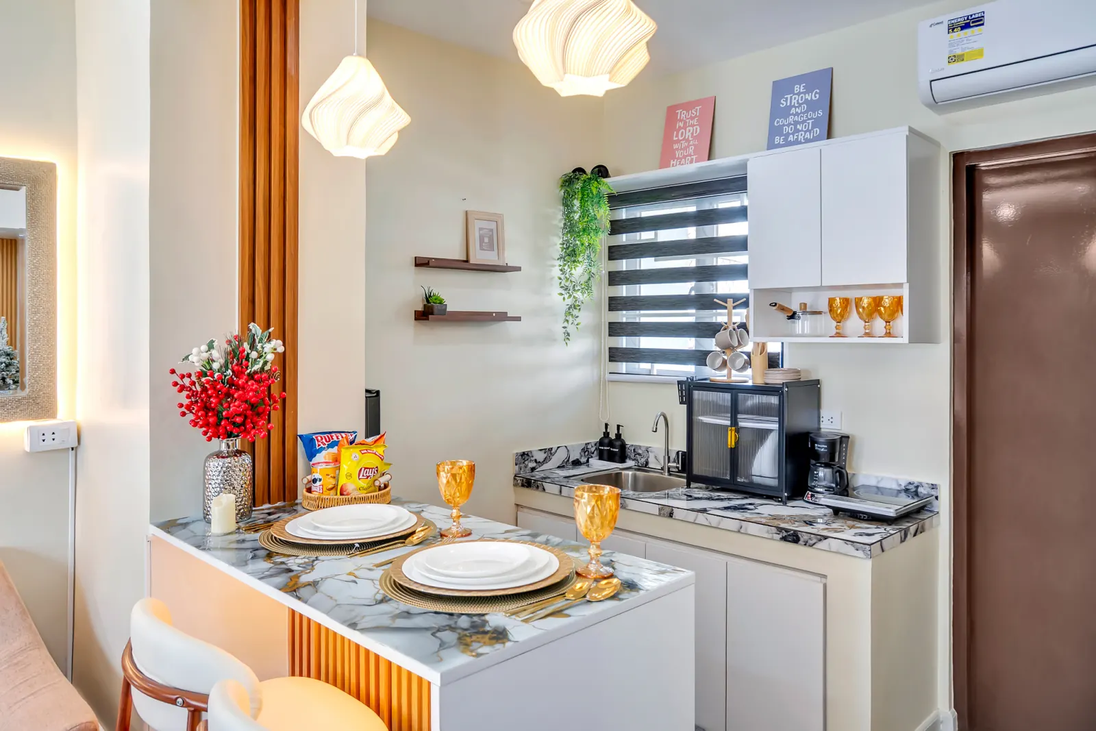 Kitchenette with breakfast counter set for two