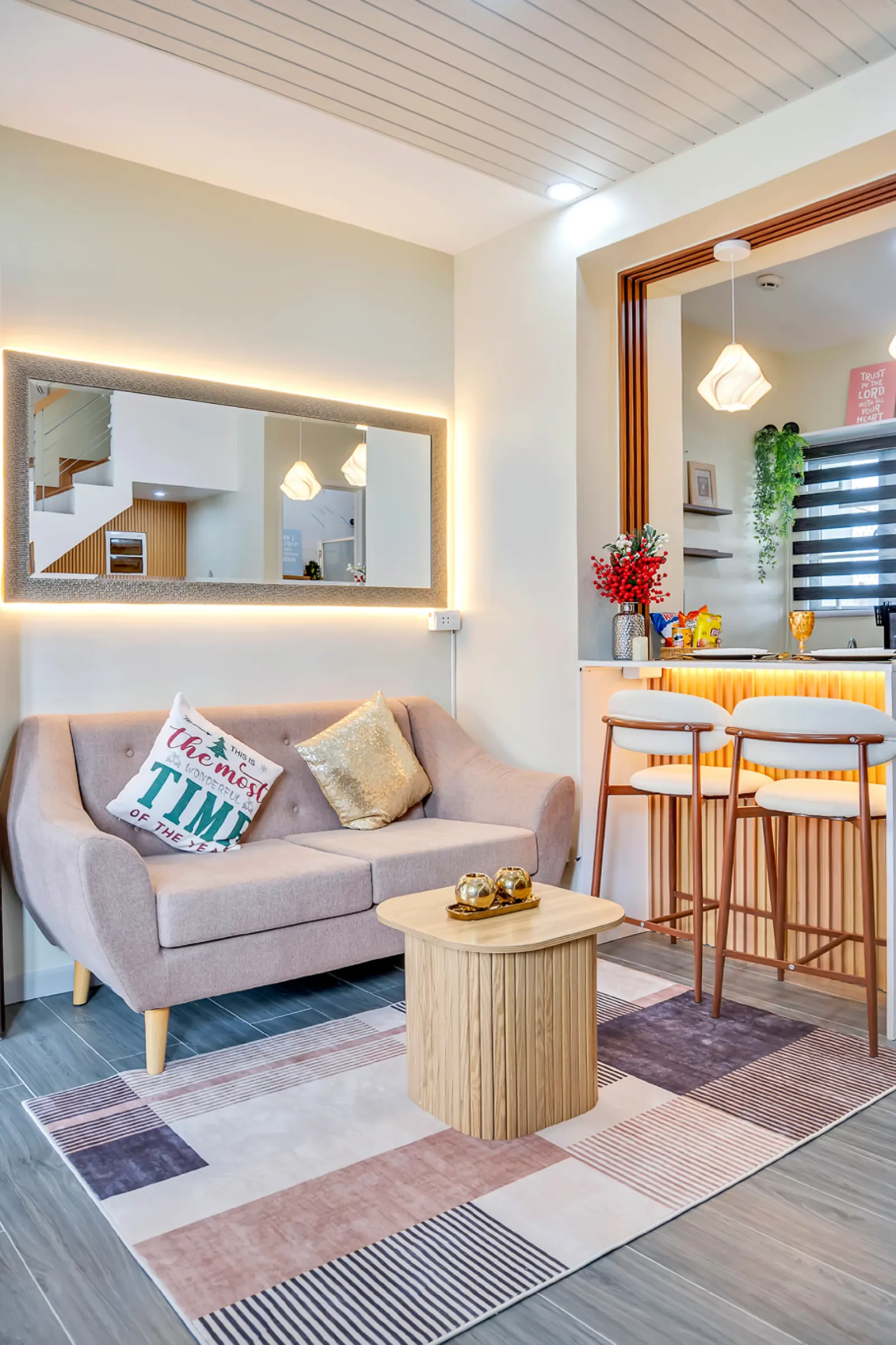 Living room with sofa and bar stools